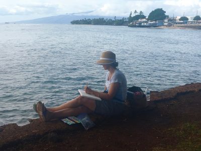 Laura painting on the Library Lawn in Lahaina