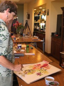 Kim working at the still life